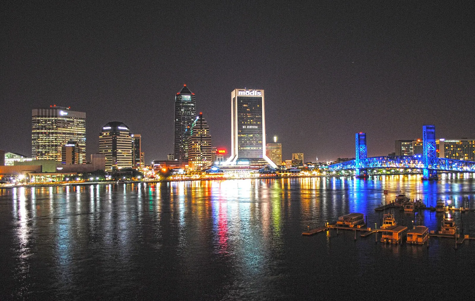 Downtown Jacksonville lit up at night across the St. Johns River