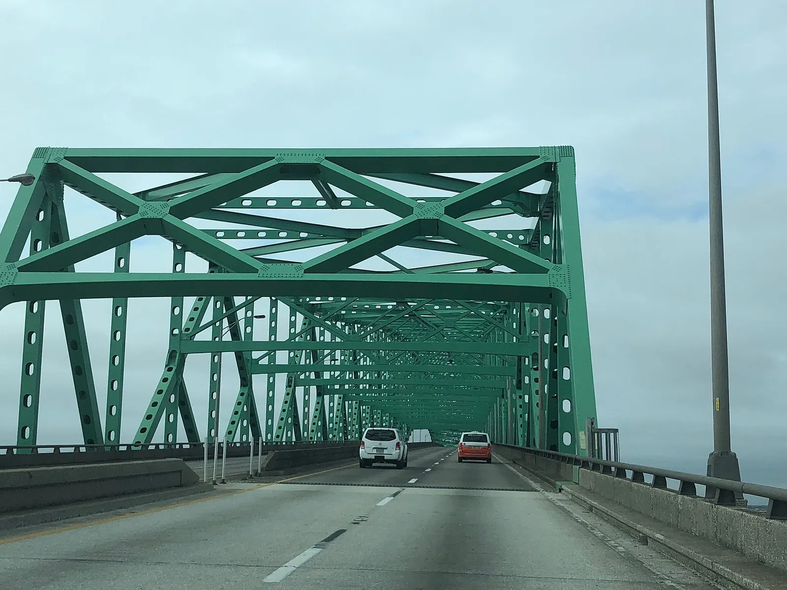 The green steel truss of the Hart Bridge, the climb runners call the Green Monster near the end of the Gate River Run.