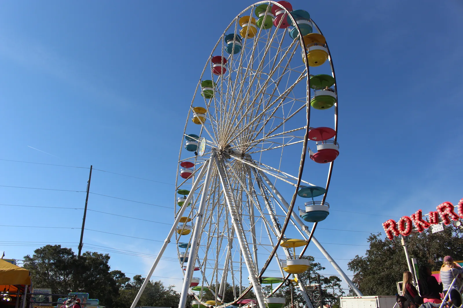 A Ferris wheel lit up at the North Florida Fair in Tallahassee, Fla. No photo of the new Jacksonville fairgrounds is yet available for reuse.