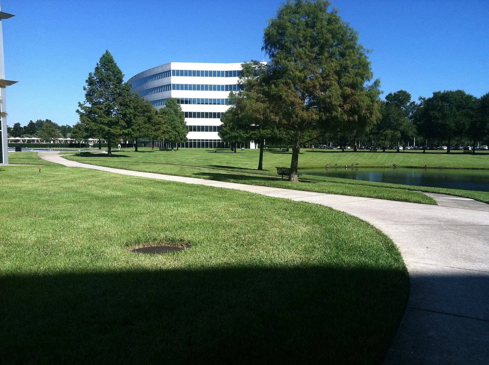 A walking path and office building on the Deerwood Crossing campus in Windy Hill, the neighborhood just north of Deerwood