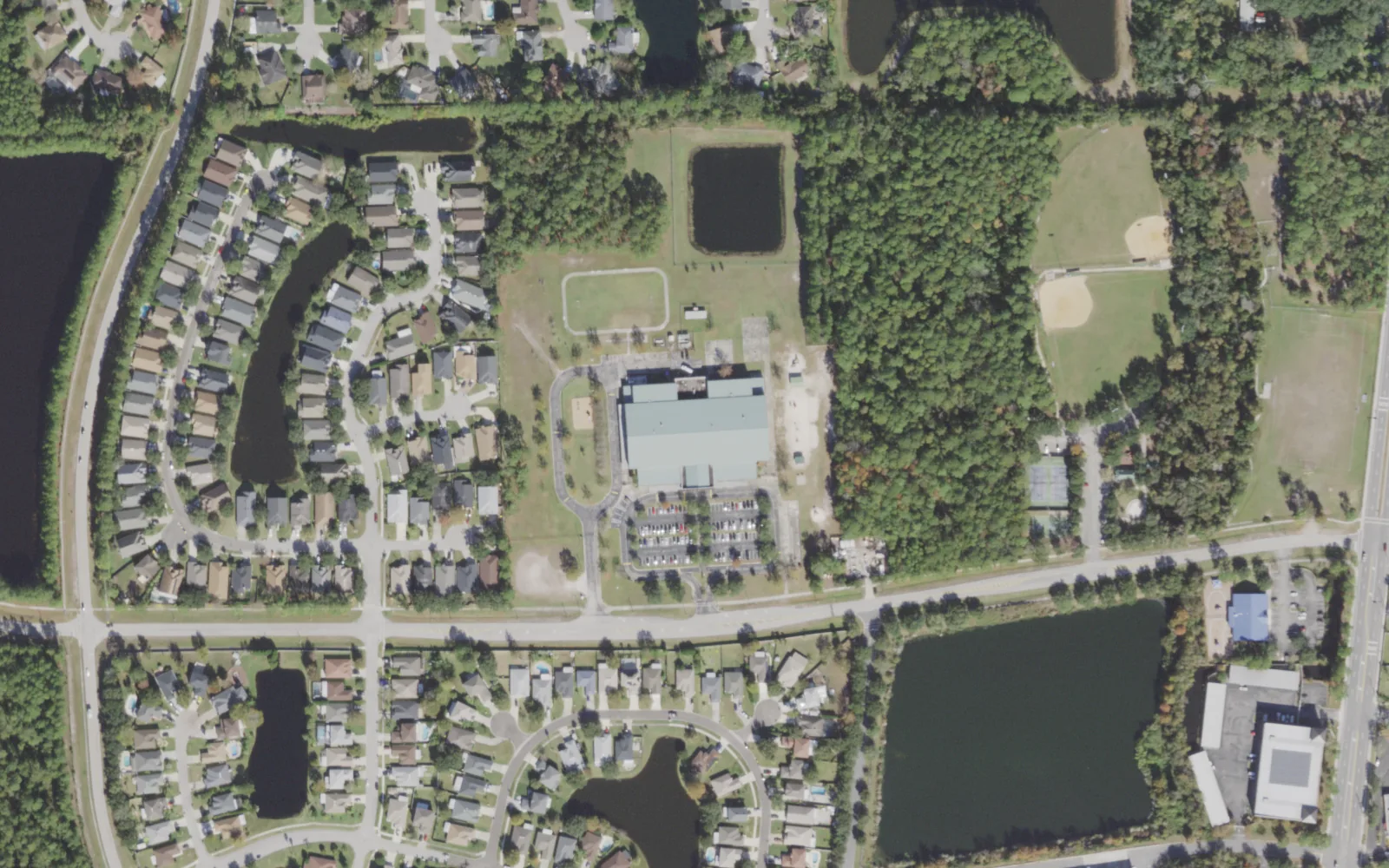 Abess Park Elementary's campus (center) and the blocks around it on Abess Boulevard in Jacksonville, seen from the air