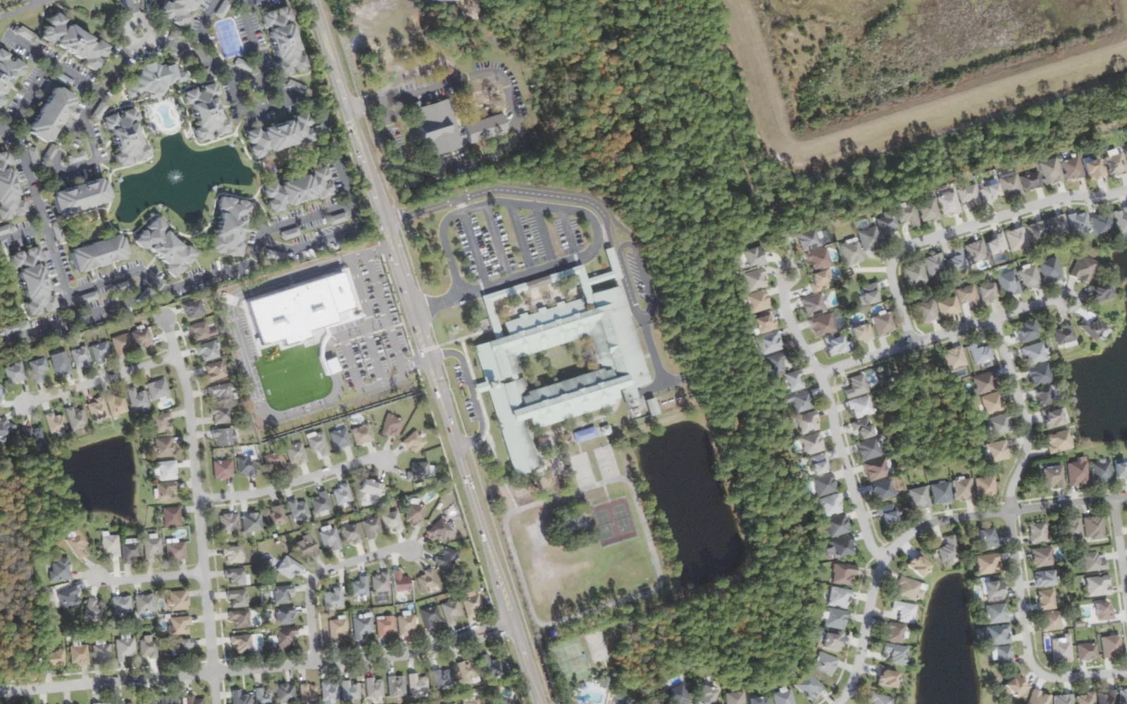 Alimacani Elementary's campus (center) and the blocks around it on San Pablo Road South in Jacksonville, seen from the air