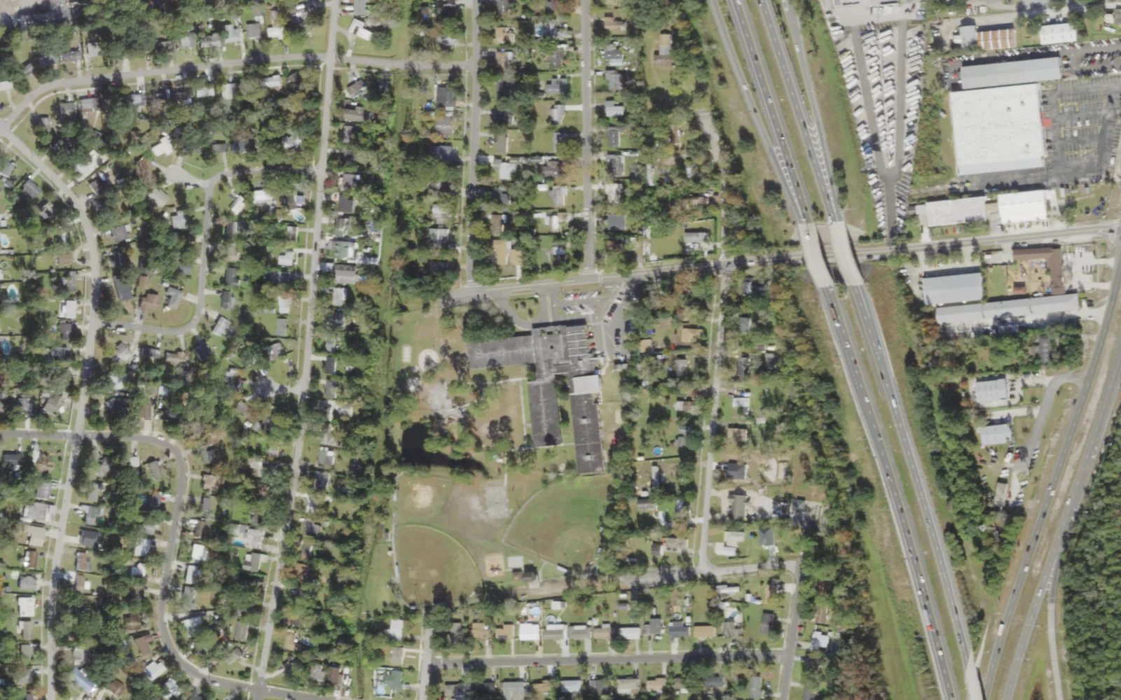 Brookview Elementary's campus (center) and the blocks around it on Theresa Drive in Jacksonville, seen from the air