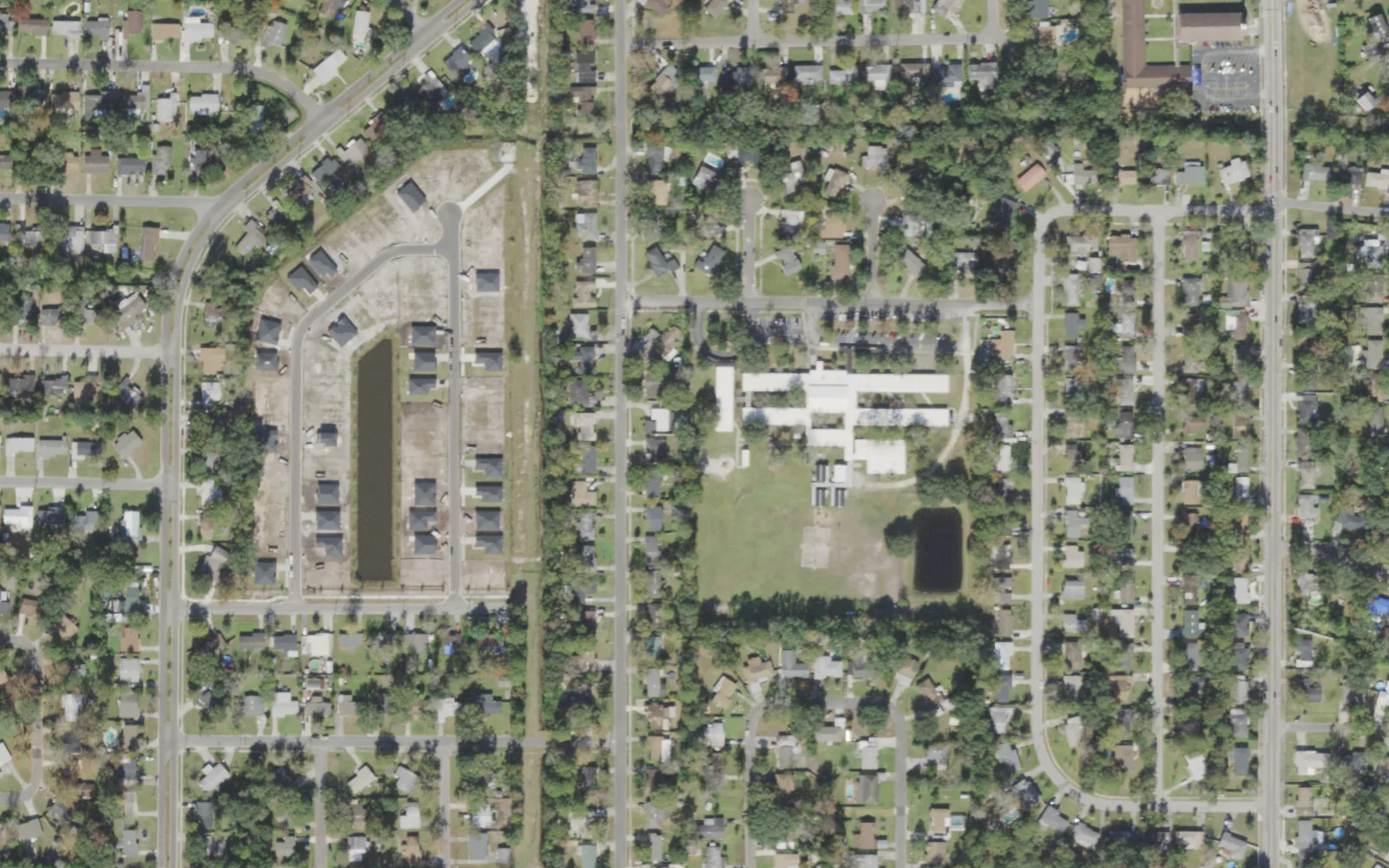 Cedar Hills Elementary's campus (center) and the blocks around it on Ish Brant Road in Jacksonville, seen from the air