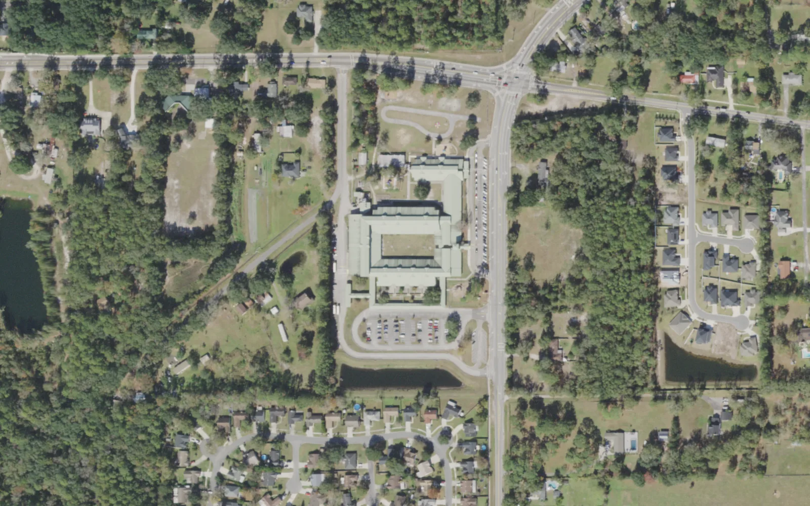 Crystal Springs Elementary's campus (center) and the blocks around it on Hammond Boulevard in Jacksonville, seen from the air