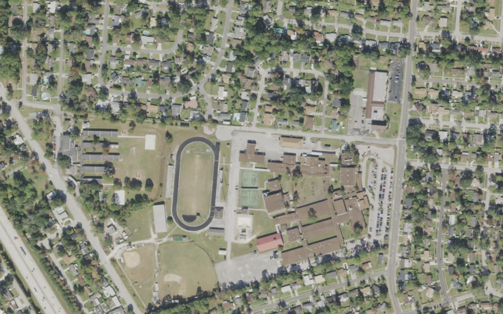 Englewood High's campus (center) and the blocks around it on Barnes Road in Jacksonville, seen from the air