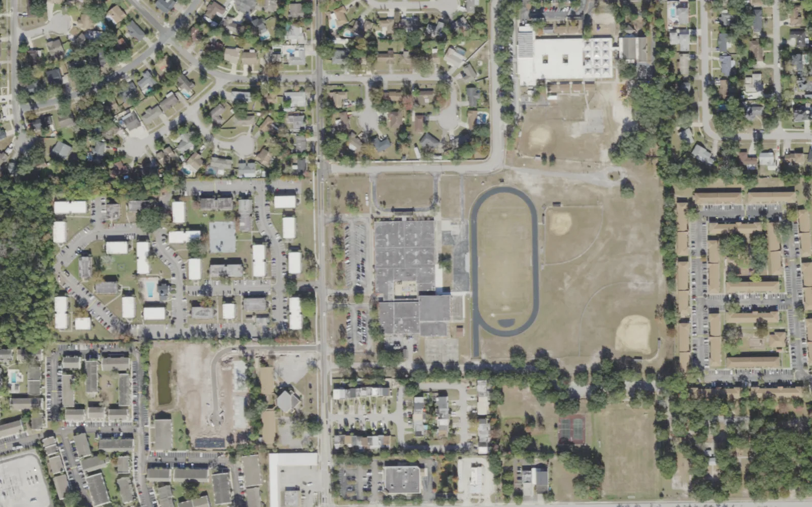 Fort Caroline Middle's campus (center) and the blocks around it on University Club Boulevard in Jacksonville, seen from the air