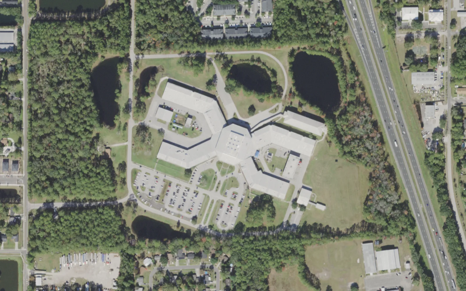 Frank H. Peterson Academies of Technology's campus (center) and the blocks around it on Wilson Boulevard in Jacksonville, seen from the air