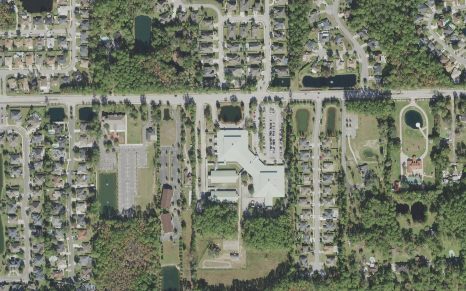 Greenland Pines Elementary's campus (center) and the blocks around it on Greenland Road in Jacksonville, seen from the air