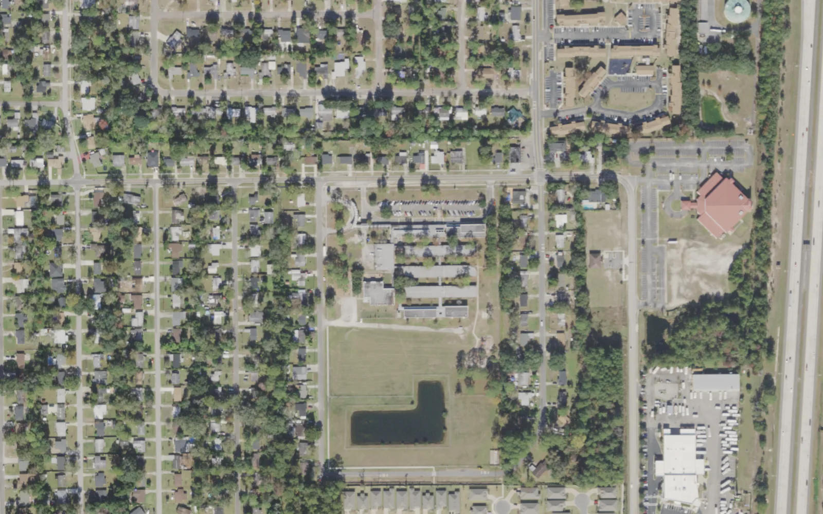 Highlands Estates Academy's campus (center) and the blocks around it on DePaul Drive in Jacksonville, seen from the air