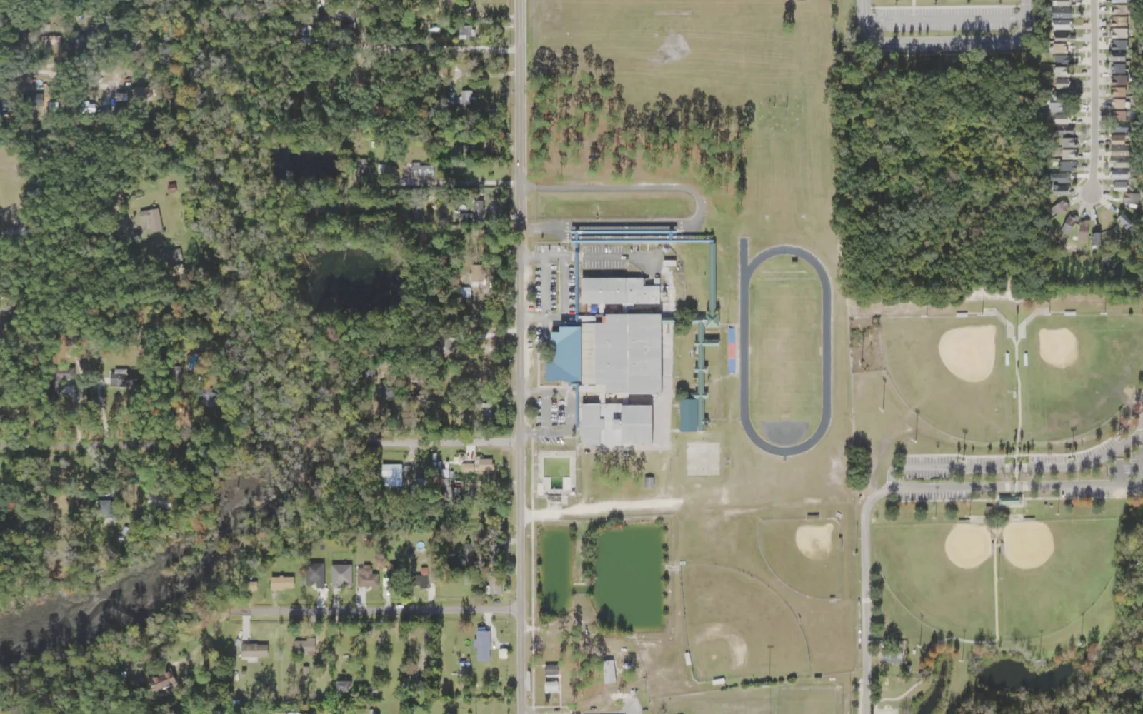 Highlands Middle's campus (center) and the blocks around it on Pine Estates Road East in Jacksonville, seen from the air