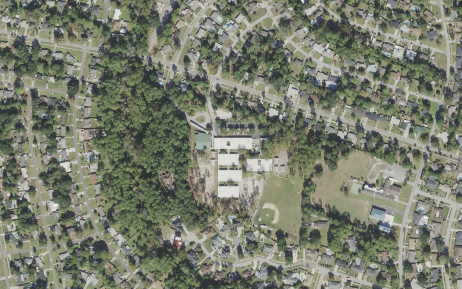 Holiday Hill Elementary's campus (center) and the blocks around it on Altama Road in Jacksonville, seen from the air