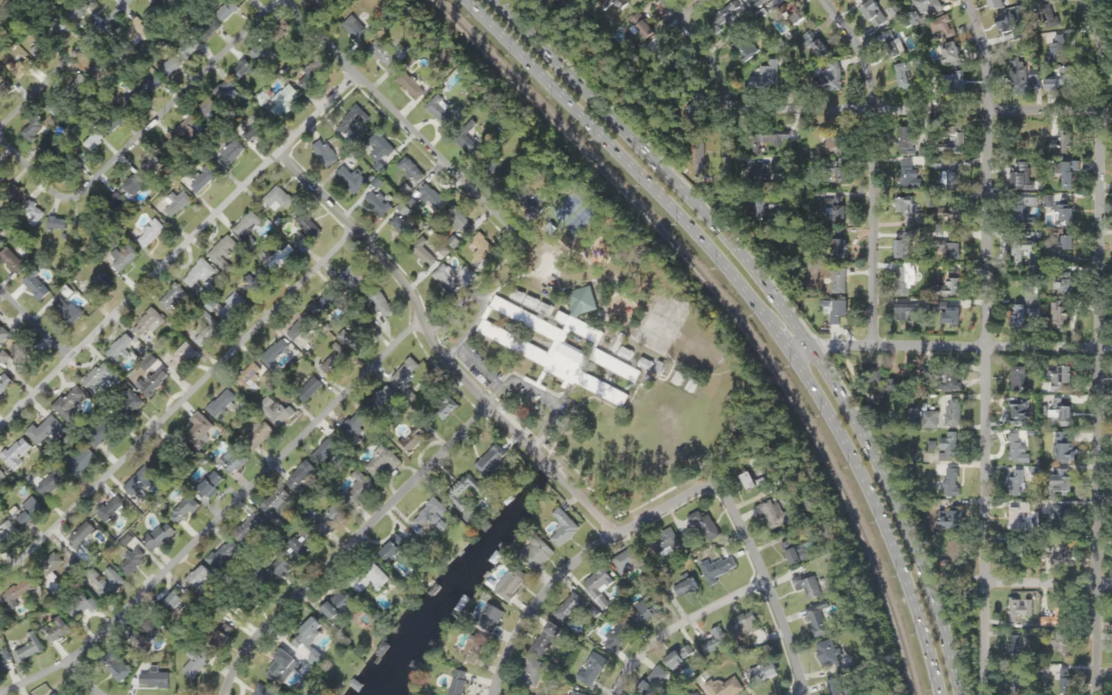 John Stockton Elementary's campus (center) and the blocks around it on Carlisle Road in Jacksonville, seen from the air