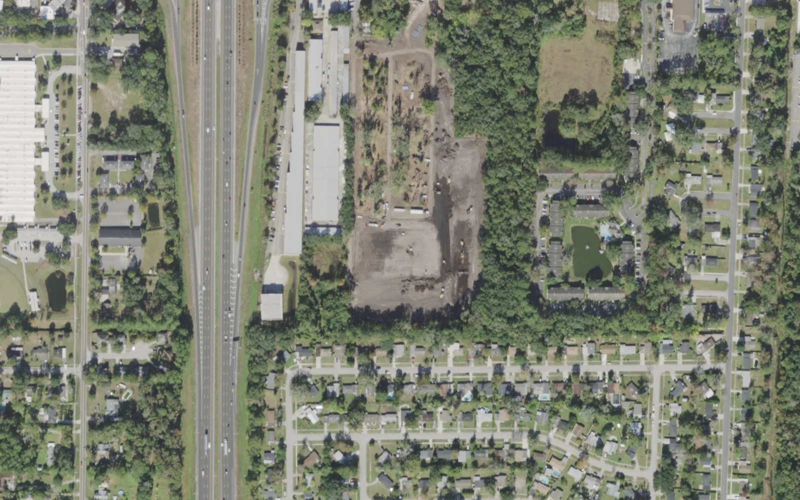 The site on 103rd Street where KIPP Impact Academy's campus (center) was built, seen from the air in November 2021, before the school opened in the 2022-23 school year