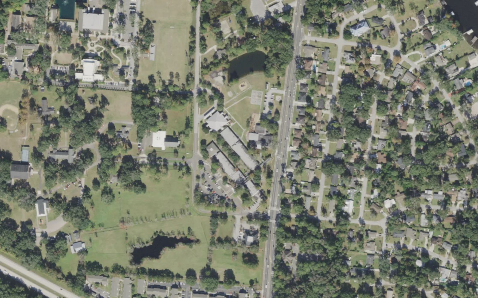 Love Grove Elementary's campus (center) and the blocks around it on University Boulevard South in Jacksonville, seen from the air