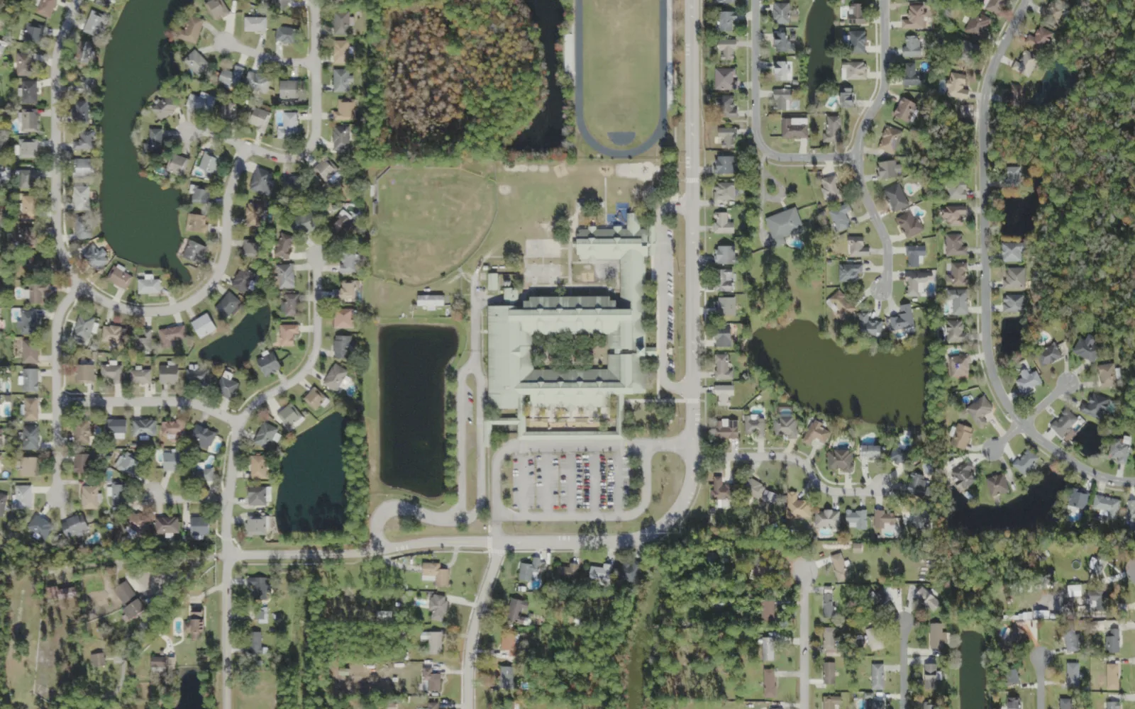 Mandarin Oaks Elementary's campus (center) and the blocks around it on Hornets Nest Road in Jacksonville, seen from the air