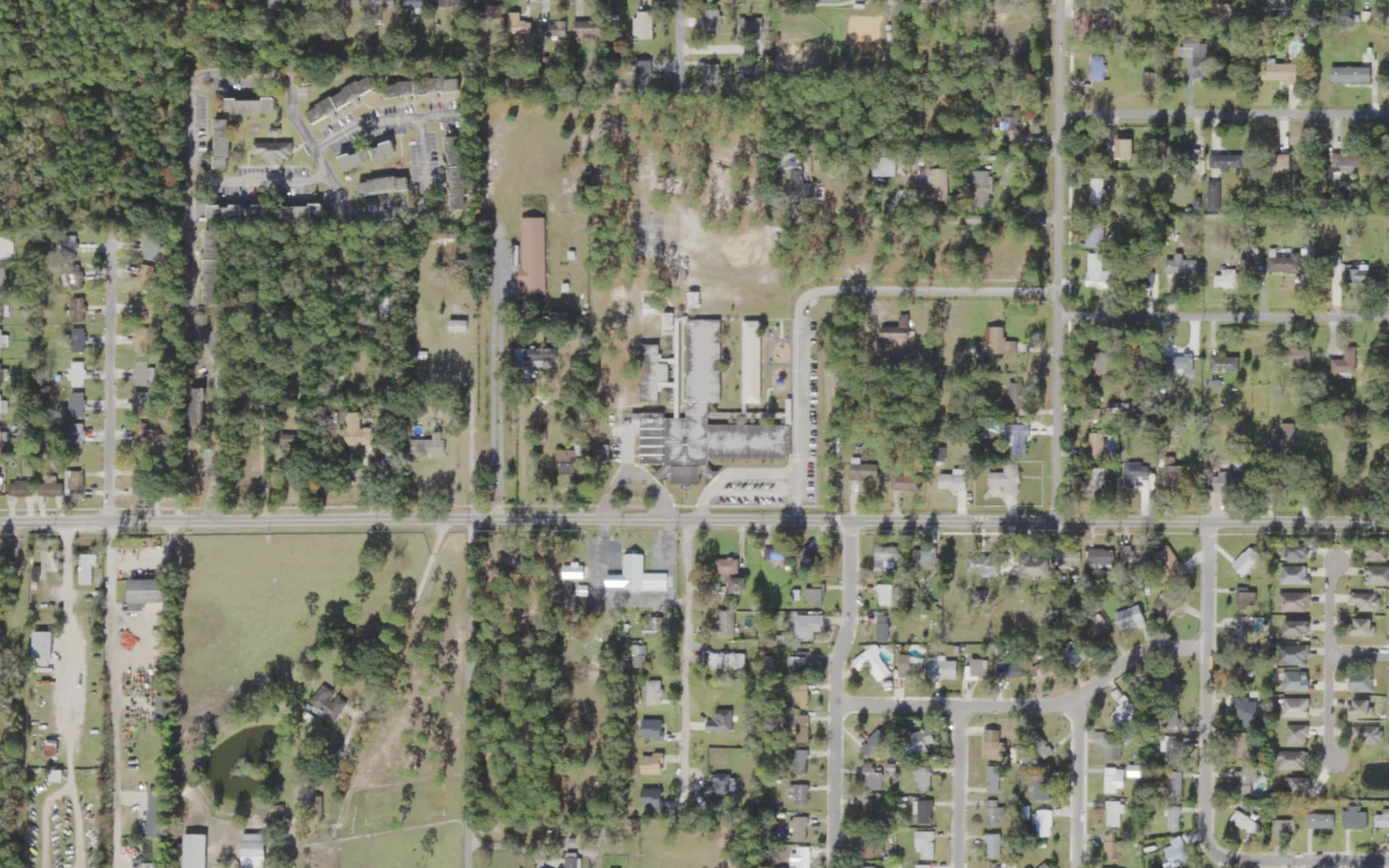 Normandy Village Elementary's campus (center) and the blocks around it on Herlong Road in Jacksonville, seen from the air