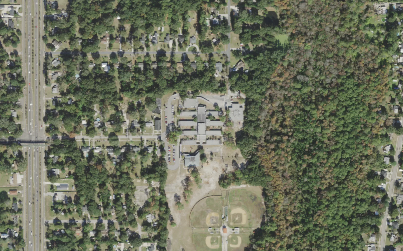 Southside Estates Elementary's campus (center) and the blocks around it on Jupiter Court South in Jacksonville, seen from the air