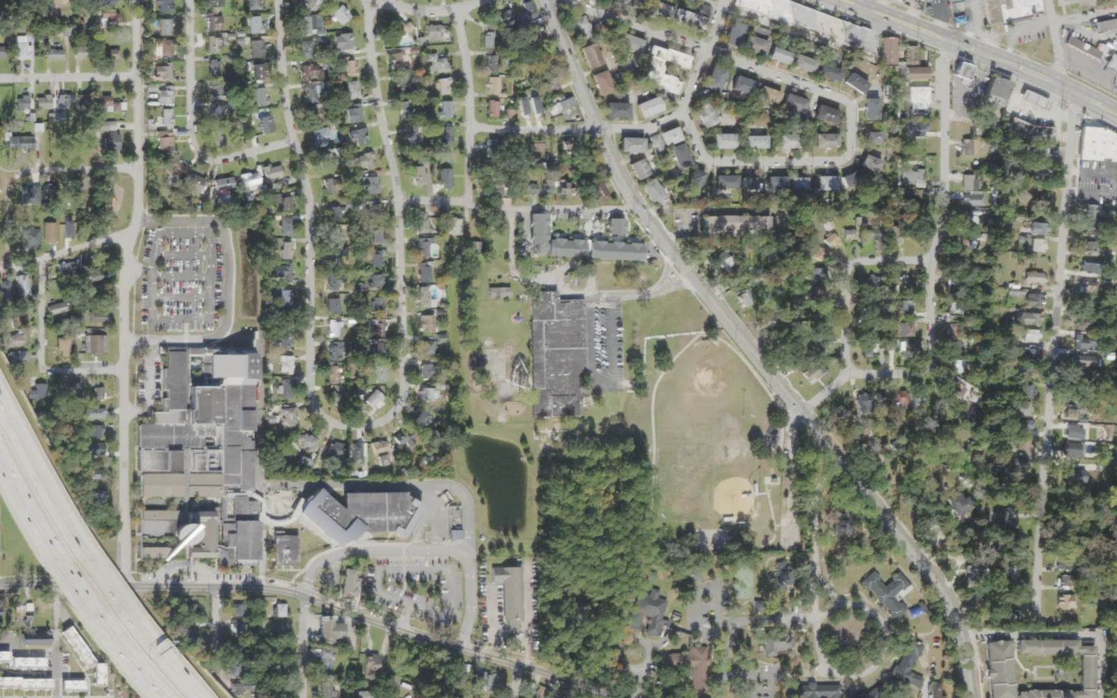 Spring Park Elementary's campus (center) and the blocks around it on Spring Park Road in Jacksonville, seen from the air