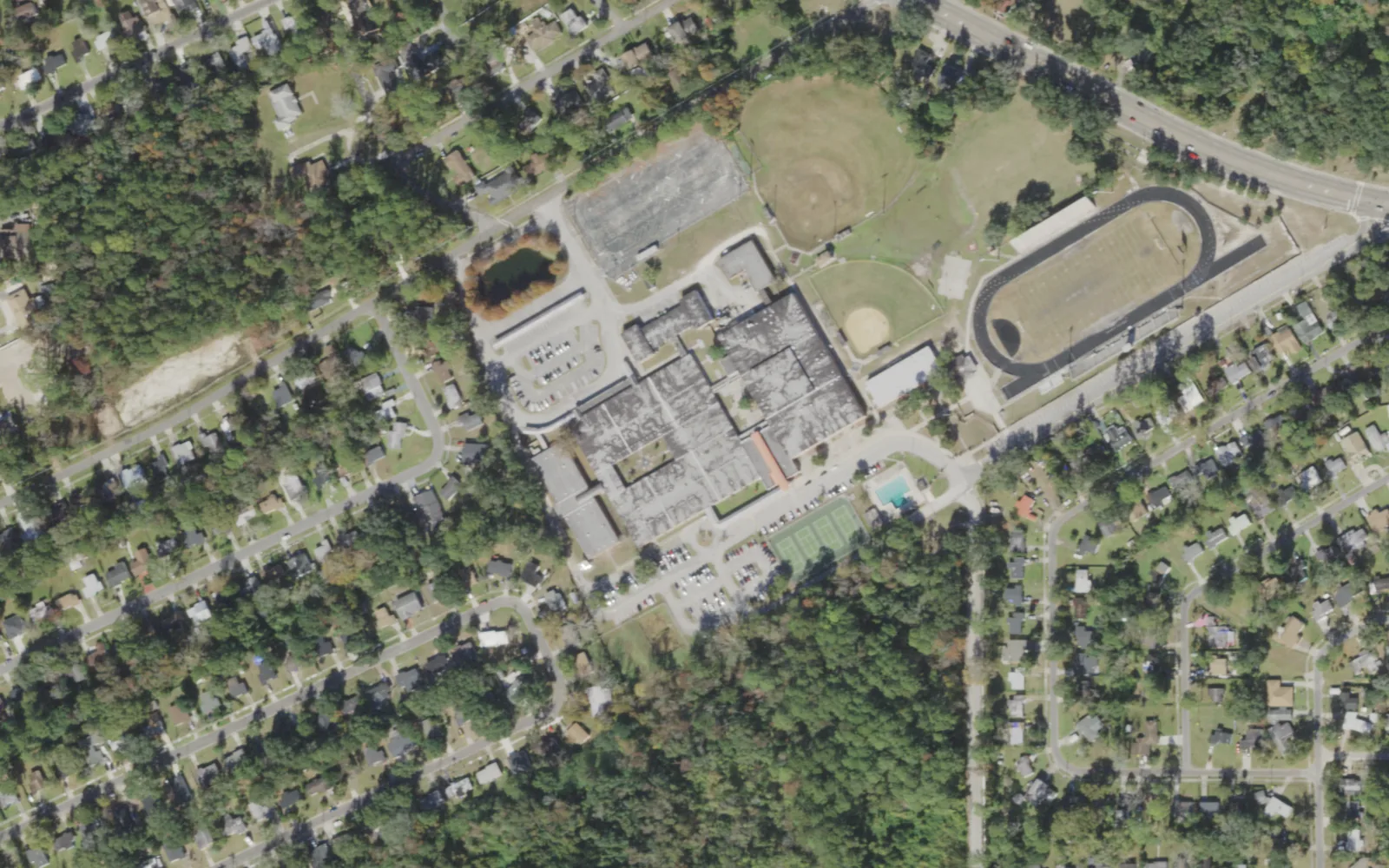 William M. Raines High's campus (center) and the blocks around it on Raines Avenue in Jacksonville, seen from the air