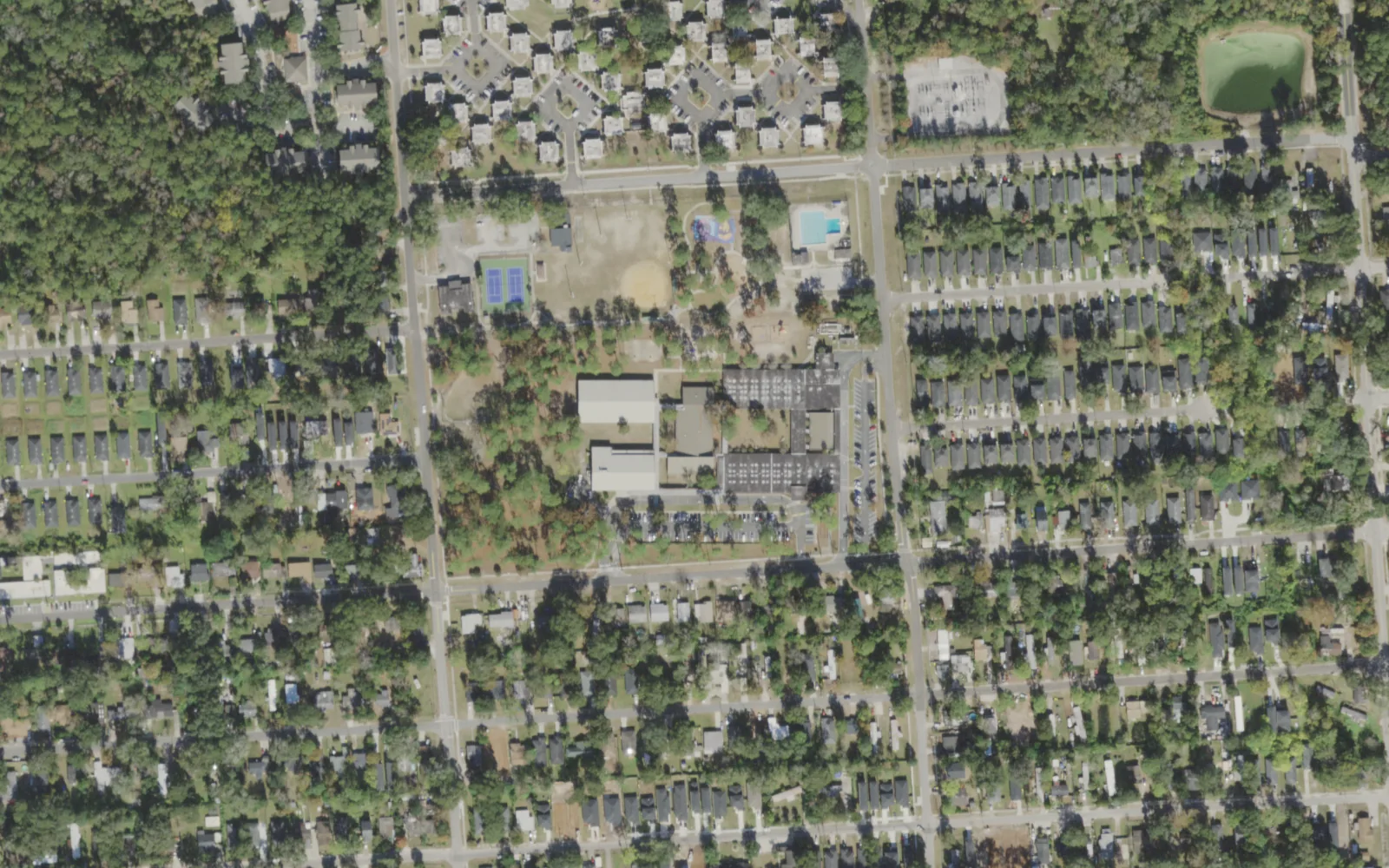 Woodland Acres Elementary's campus (center) and the blocks around it on Bowlan Street North in Jacksonville, seen from the air